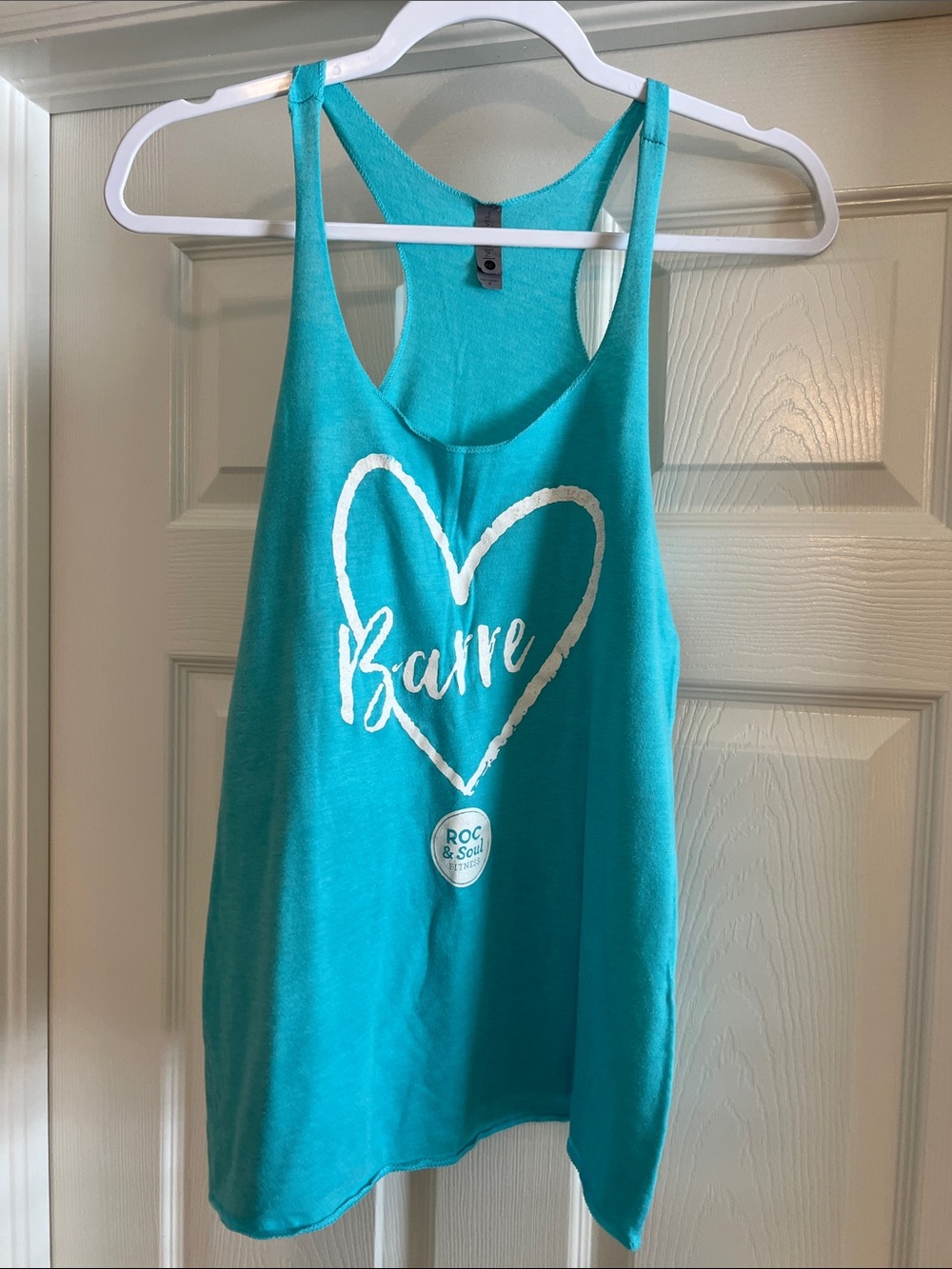 Next Level Apparel Teal Racerback Tank with White Heart Barre Graphic